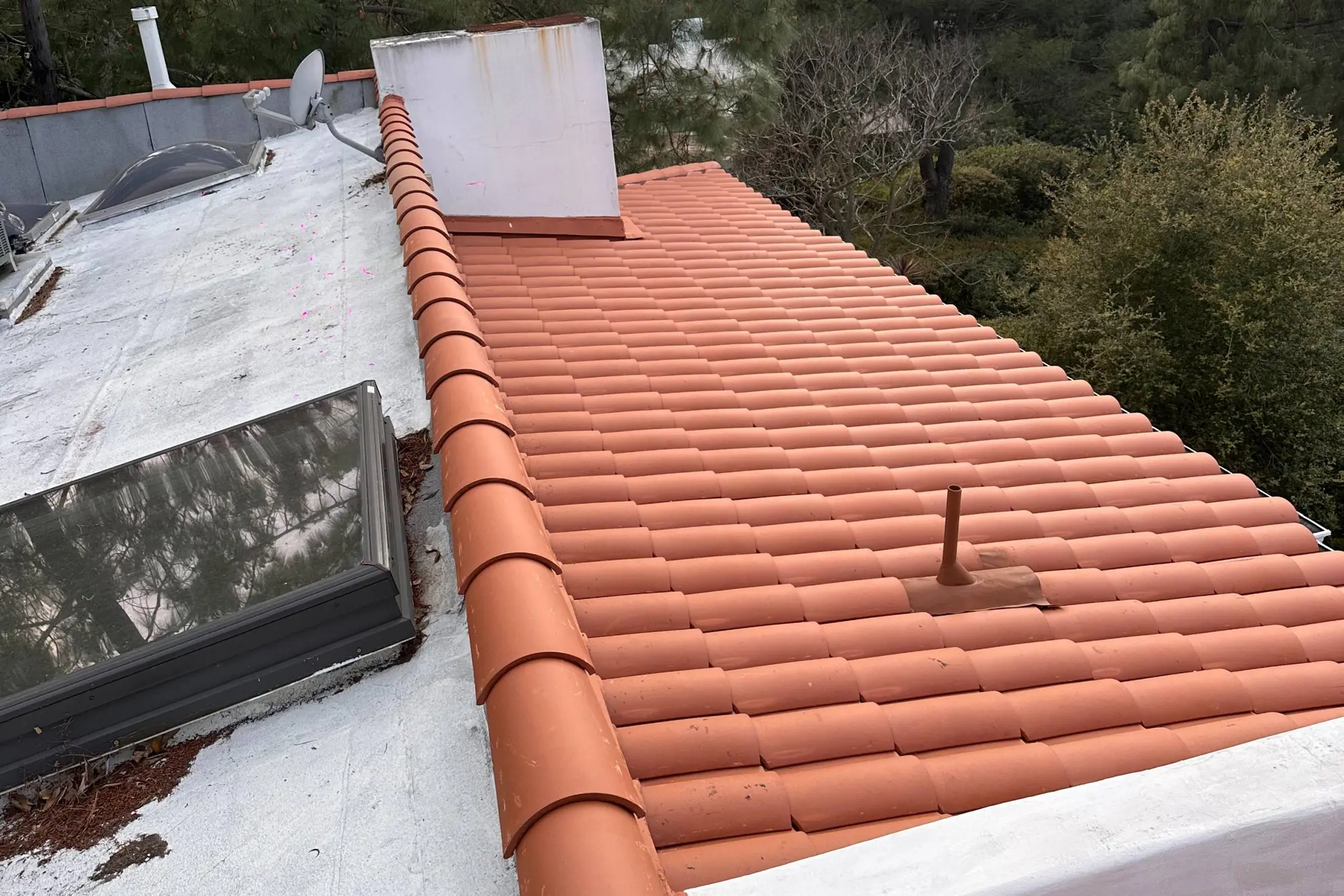 Terracotta clay tile roof over white stucco on Mulholland Dr, Los Angeles