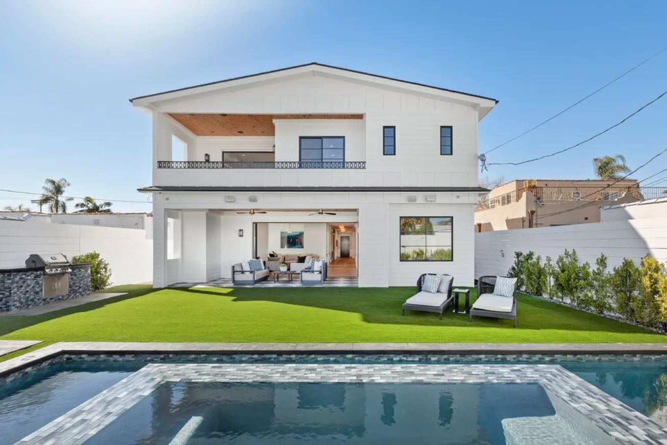 Backyard pool and outdoor living area at N Poinsettia Pl, Los Angeles